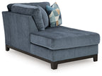 Navy left corner chaise sofa with angled arm and geometric throw pillow, dark legs