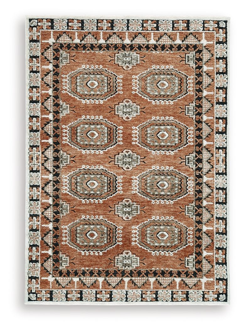 Brown area rug with square medallion motif and black-and-cream border accents.