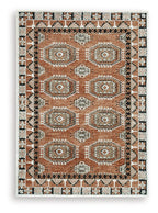 Brown area rug with square medallion motif and black-and-cream border accents.