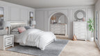 Panel bedroom furniture set with bed, nightstands, dresser, and mirror, white.
