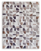 Jettner area rug with geometric square mosaic pattern in light gray and dark navy