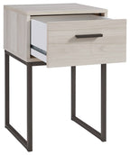 Light natural nightstand with one open drawer, dark metal legs, bar pull
