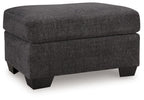 Dark gray fabric ottoman with square upholstered top and black block legs