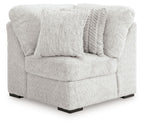 Sectional wedge armchair, light gray fabric with tufted back and square seat