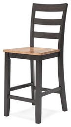 Grey-brown wooden barstool with slatted back and square wood seat.