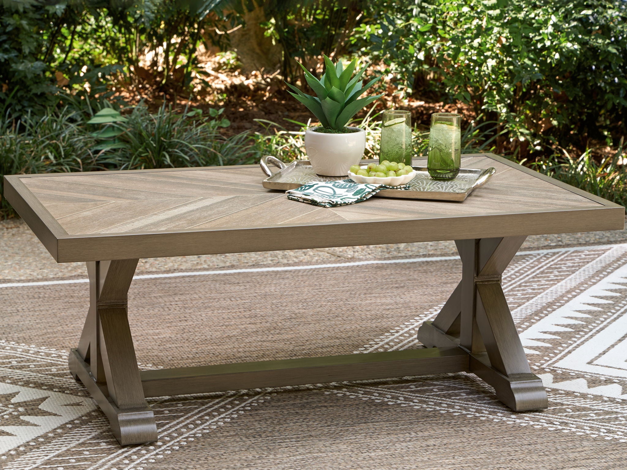 Rectangular cocktail table with beige wood-grain tabletop and X-style side supports