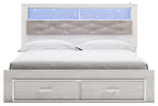 White king upholstered bookcase bed with blue shelf panel and two storage drawers