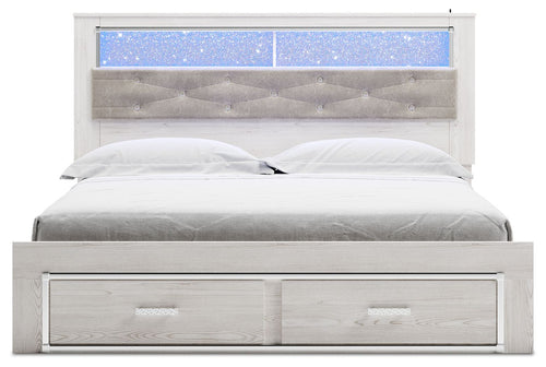 White king upholstered bookcase bed with blue shelf panel and two storage drawers
