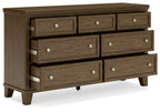 Medium brown wood dresser angled view with six drawers and silver metal knobs