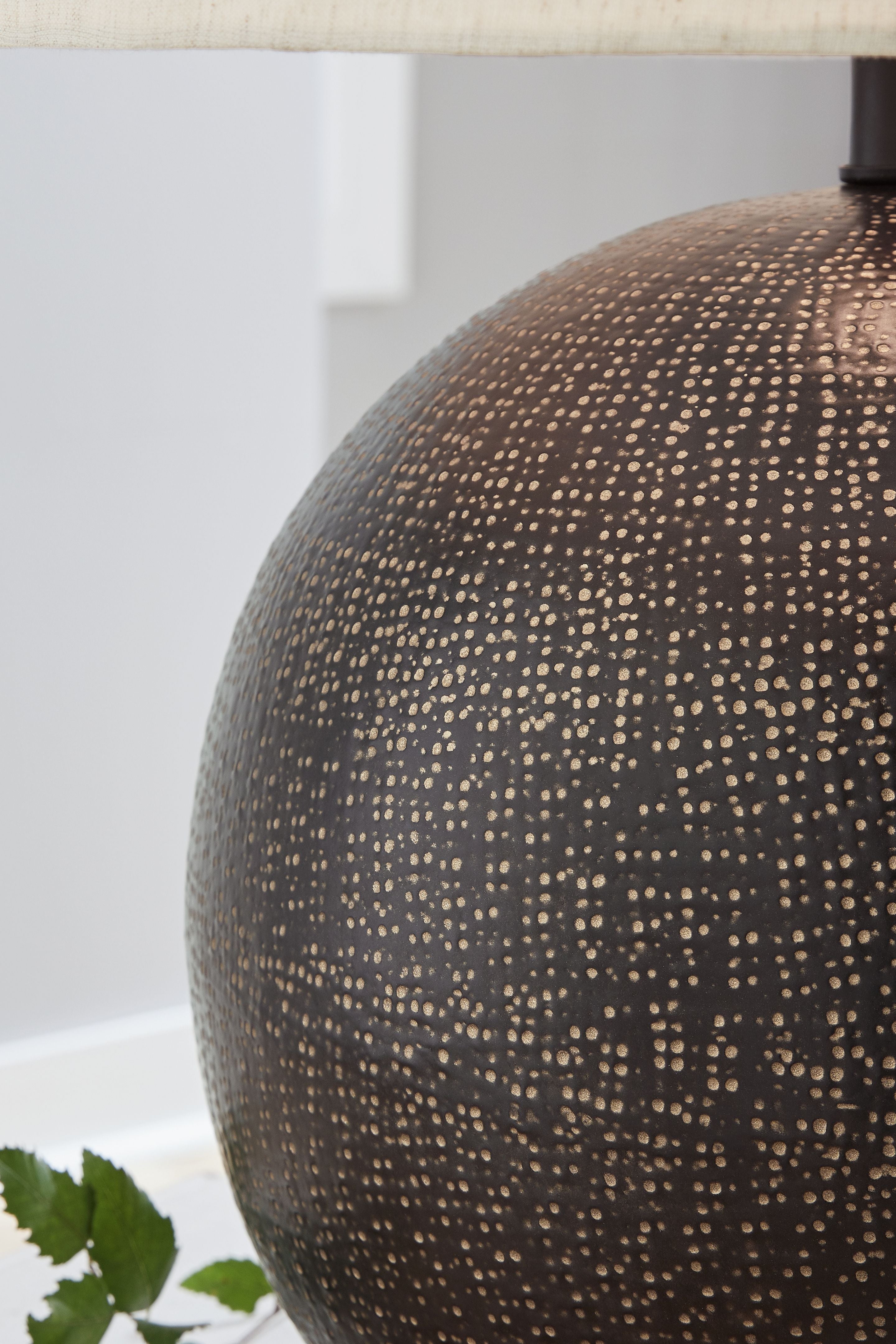 Metal table lamp globe base, dark finish with gold fleck texture