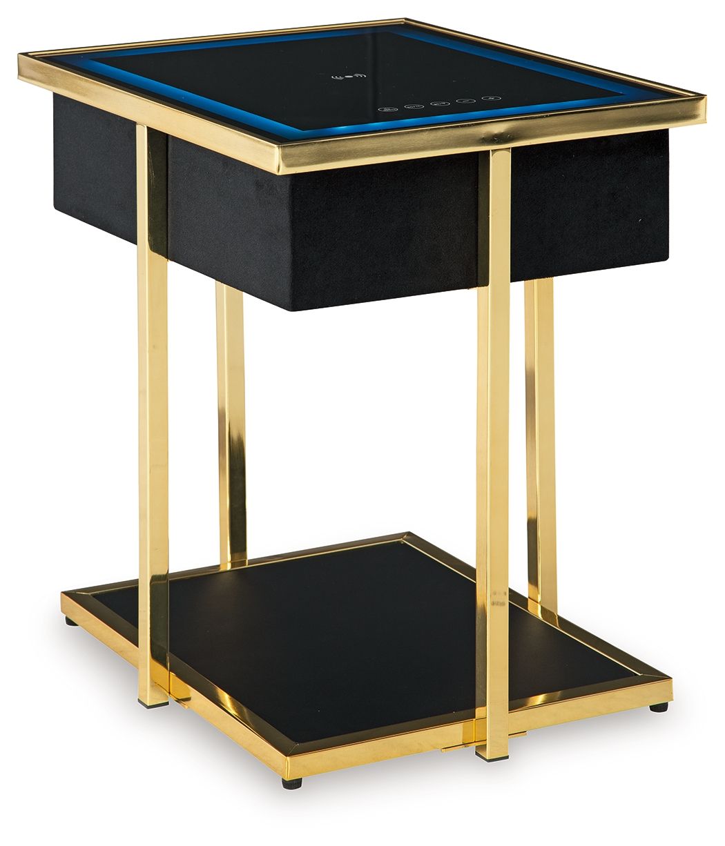 Black accent table with gold legs and blue-lit top panel, glass shelf and speaker area