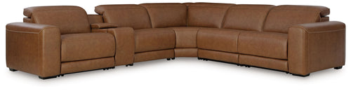 Caramel reclining sectional sofa with rounded arms and tufted back cushions