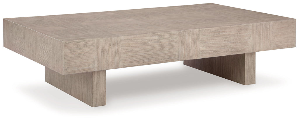 Jorlaina rectangular table with light beige wood-look top and chunky angled legs