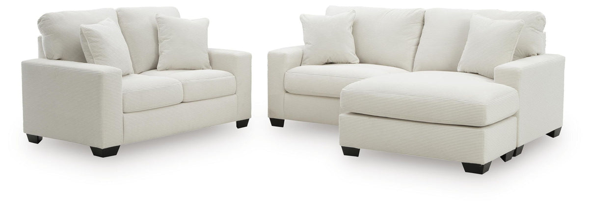 Light gray sofa chaise and loveseat set with square arms and matching throw pillows