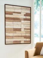 Framed wall art with abstract brick-like bands in tan, brown, and white