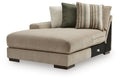 Beige upholstered corner chaise with armrest and green striped throw pillows