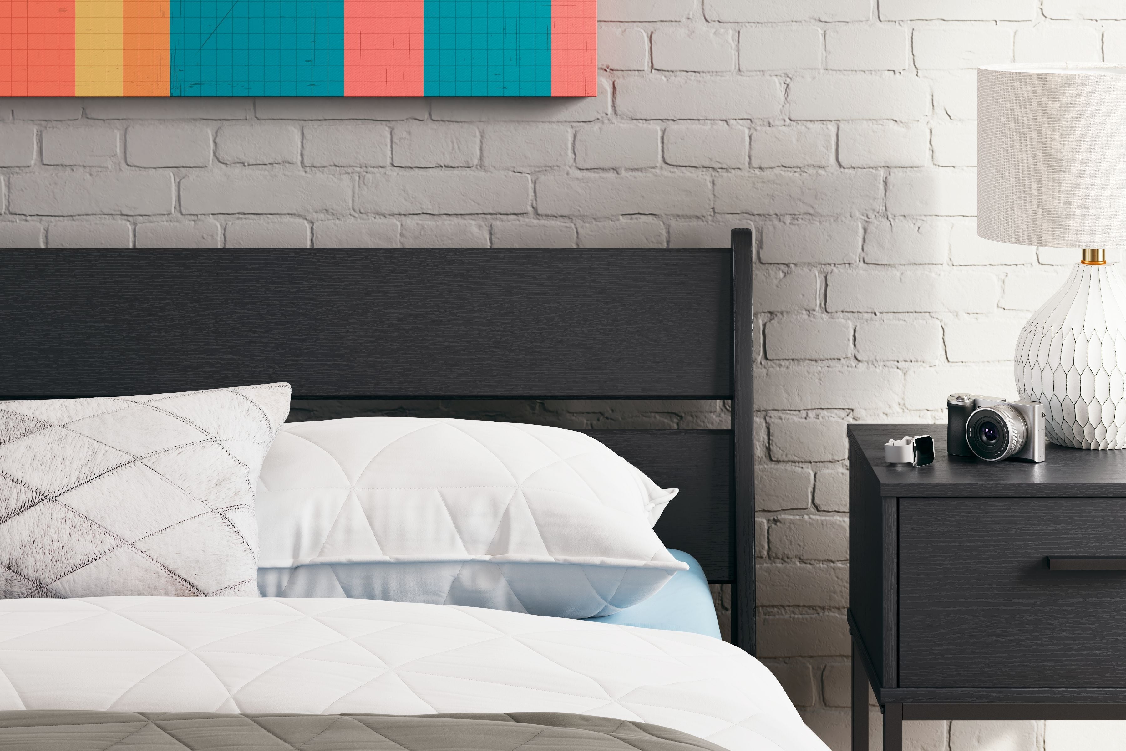 Dark charcoal panel headboard with three horizontal slats and side mounting holes