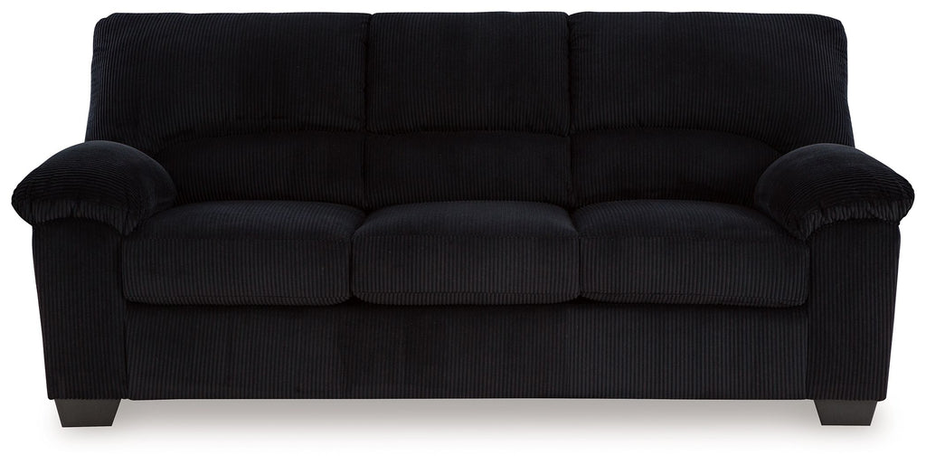 Black corduroy sofa with button-tufted back and rolled armrests
