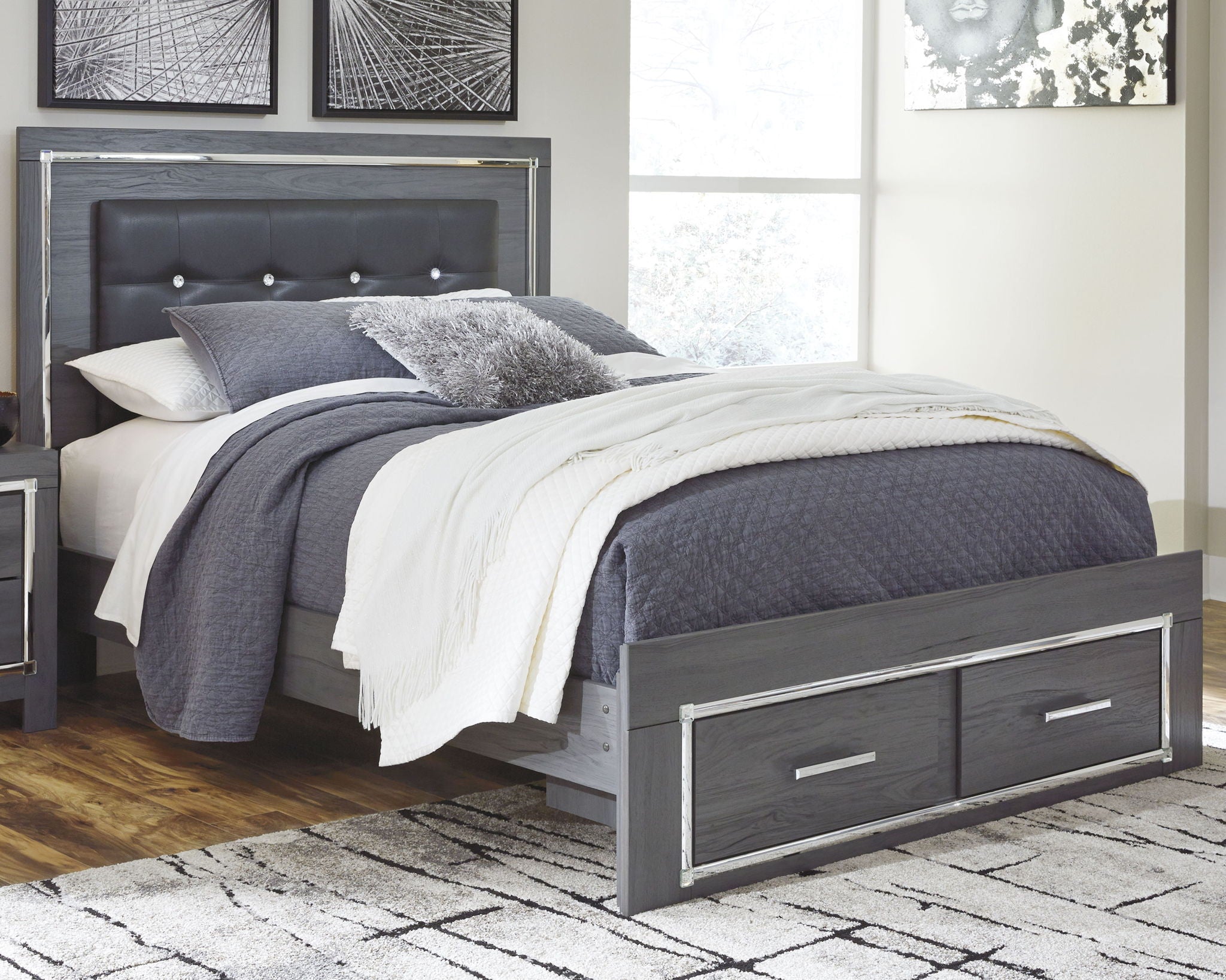 Gray upholstered panel bed with button-tufted headboard and two-drawer storage