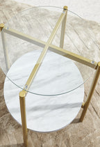 Round end table with clear glass top, circular white marble-look shelf, gold legs