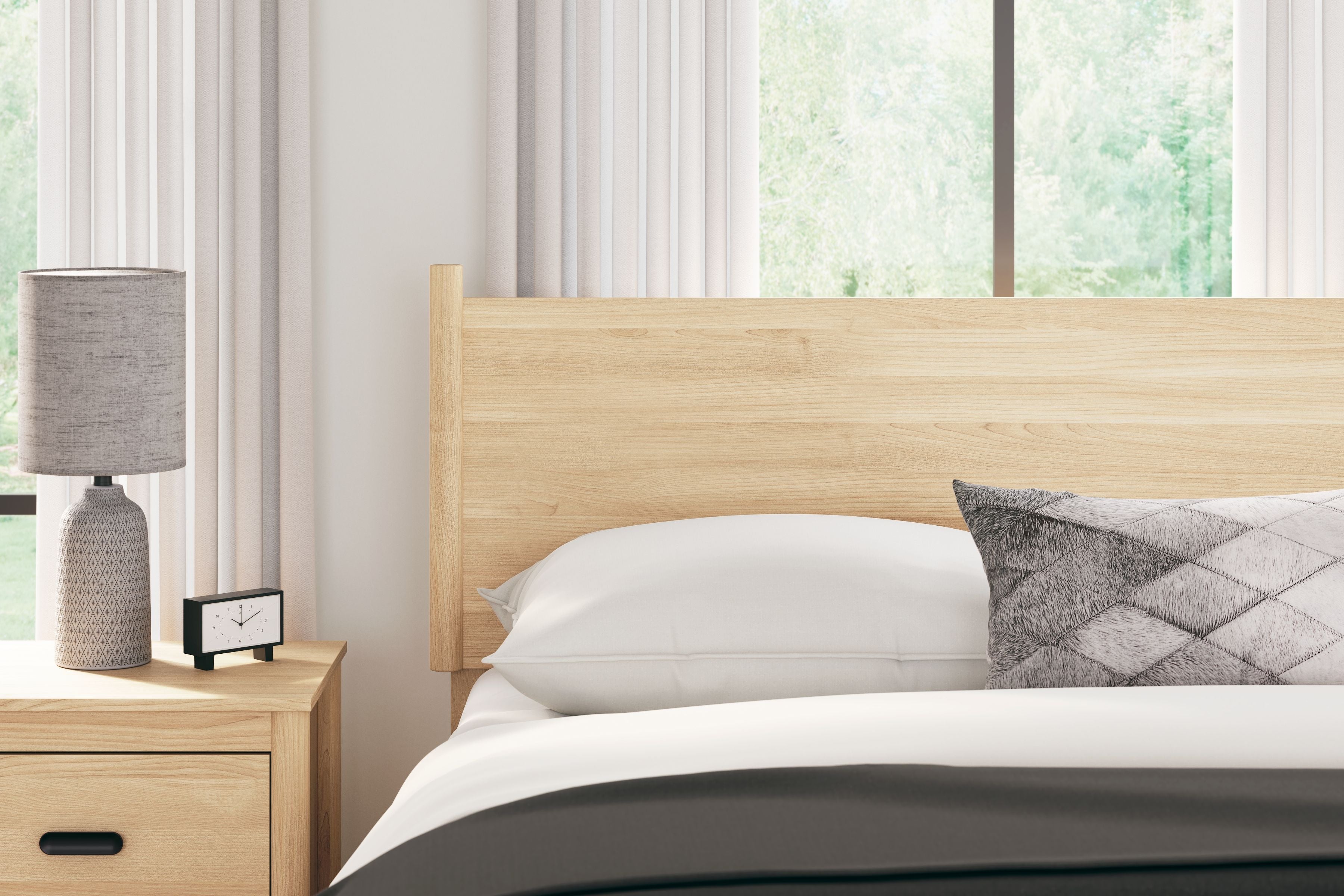 Tan queen panel headboard with rounded top corners, styled on bed with pillows