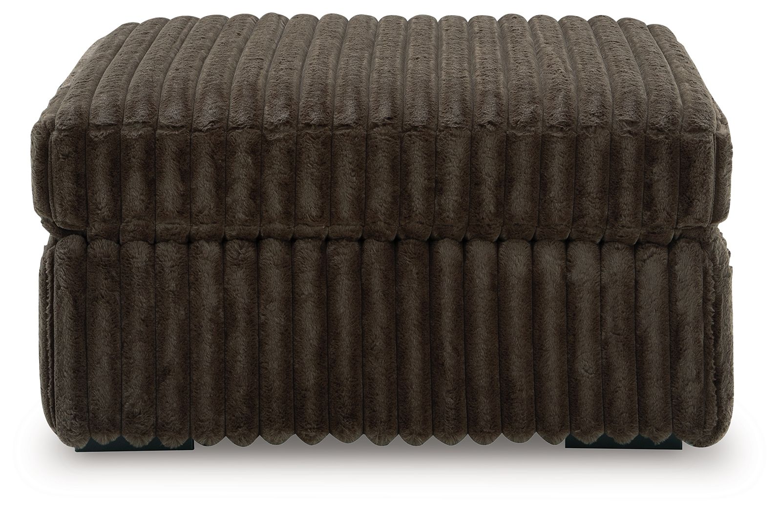 Oversized accent ottoman in taupe-brown, ribbed upholstery, tufted edges