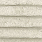 Light gray textured upholstery fabric swatch, plush shag-like pile.