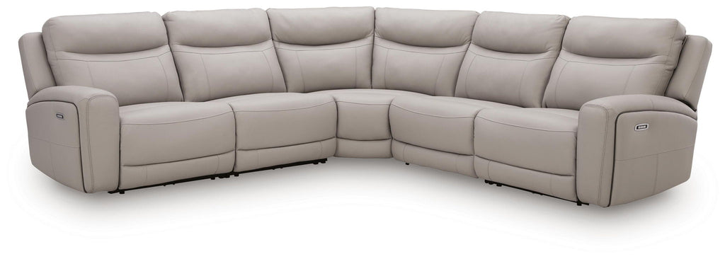 Gray power reclining sectional sofa with padded armrests and back cushions