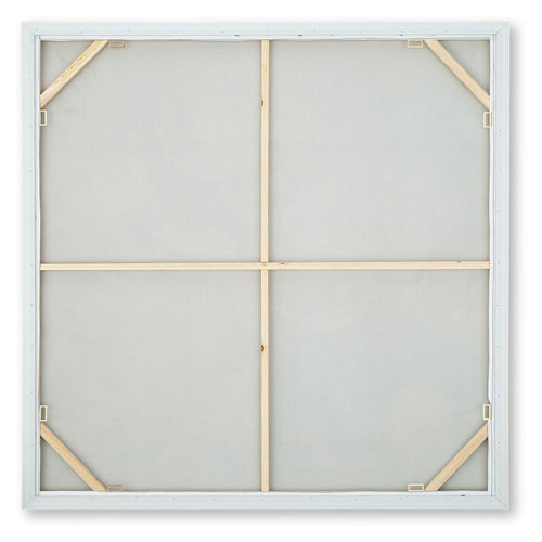 Back of framed wall art with white backing and wooden support braces