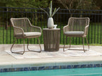 Outdoor patio set with two beige mesh chairs and a round beige side table.