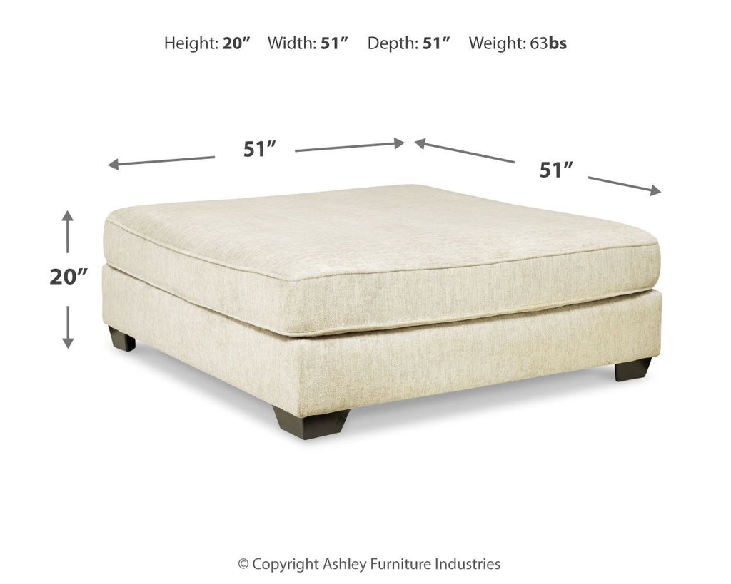 Parchment oversized ottoman with square seat and low dark legs