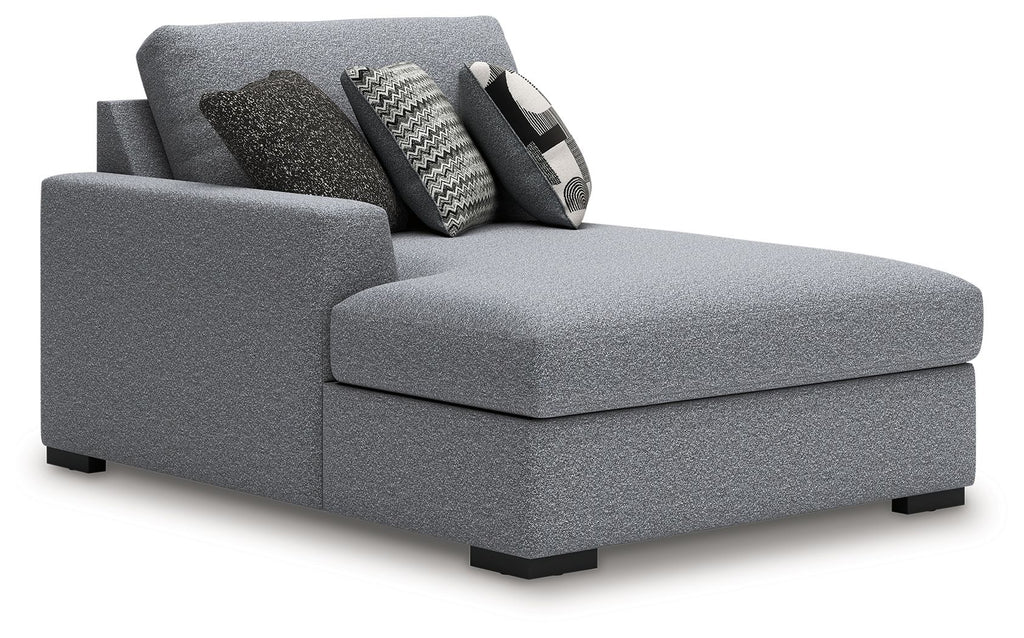 Grey fabric chaise section with armrest and ottoman-style seat