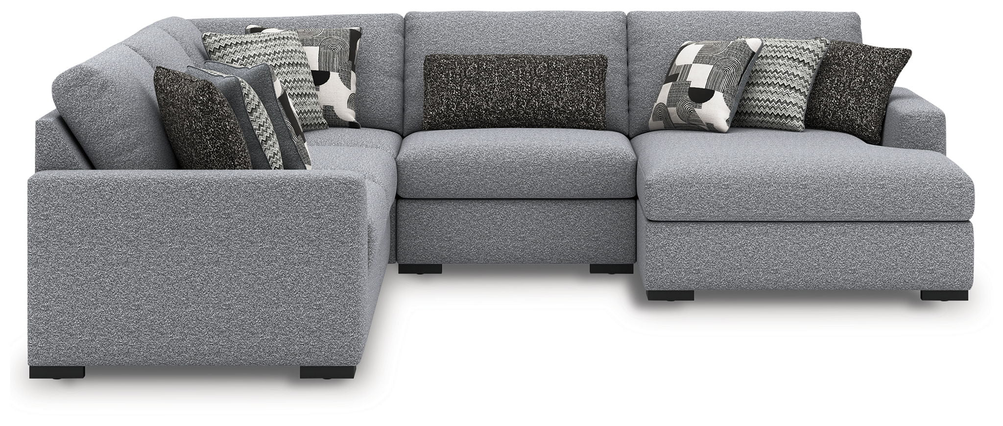 Gray sectional sofa with chaise end and patterned decorative throw pillows