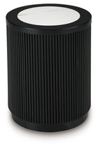 Black ribbed round table with white marble-look top and rounded base