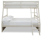 White bunk bed with guard rails and ladder; upper guard rail and mattress frame