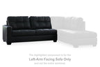 Left-arm facing dark sofa section with tufted back and padded seat