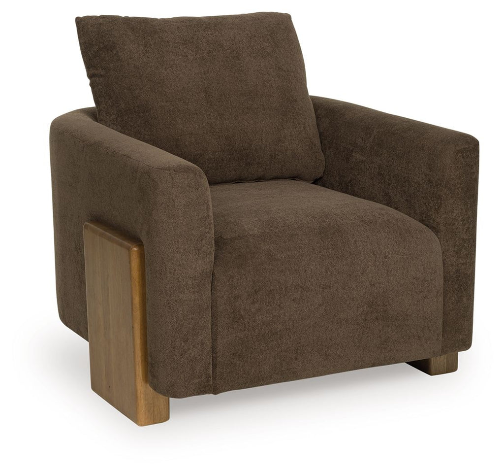 Brown accent chair with tall back, cushioned arms, and solid wood legs