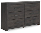 Dark gray six-drawer dresser with six metal bar pulls and flat front panels