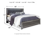 Gray upholstered panel bed with button-tufted headboard and drawer base