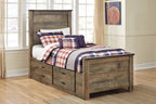 Panel bed with side drawers and navy, red, and white plaid bedding with pillows