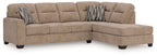 Mocha sectional sofa with corner chaise, tufted back cushions and two patterned pillows