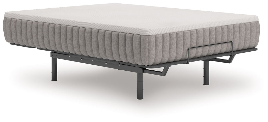 Firm white-top mattress on metal bed frame legs