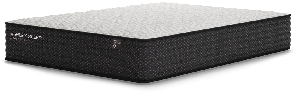 Firm mattress with white quilted top and black textured sides