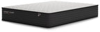 Firm mattress with white quilted top and black textured sides