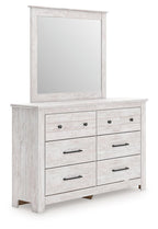 White panel dresser with attached mirror and multiple drawers with dark pulls