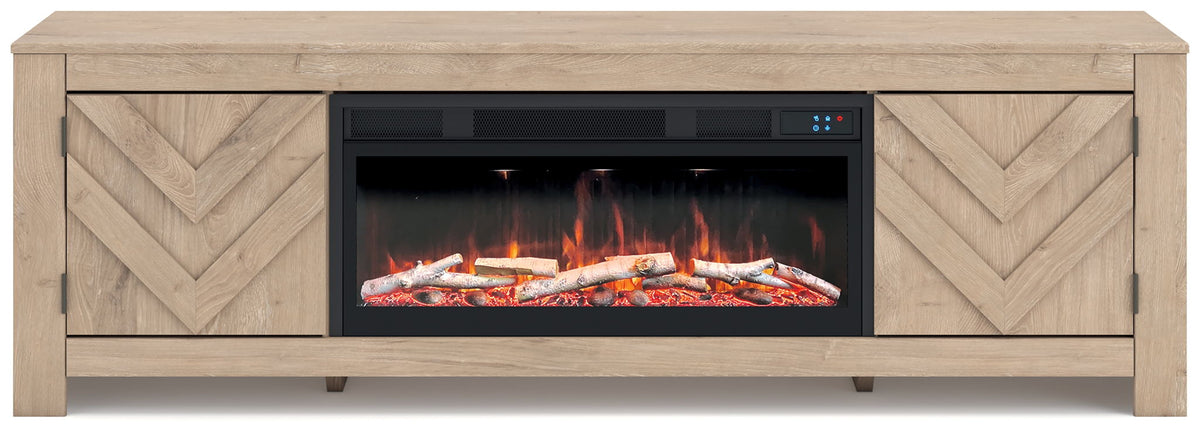 Beige fireplace TV stand with chevron doors and visible flame insert