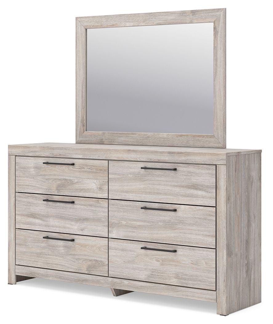 Six-drawer dresser with framed mirror and distressed light wood drawer fronts, bar handles.