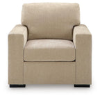 Light beige fabric accent chair viewed from front, padded arms and cushioned backrest.