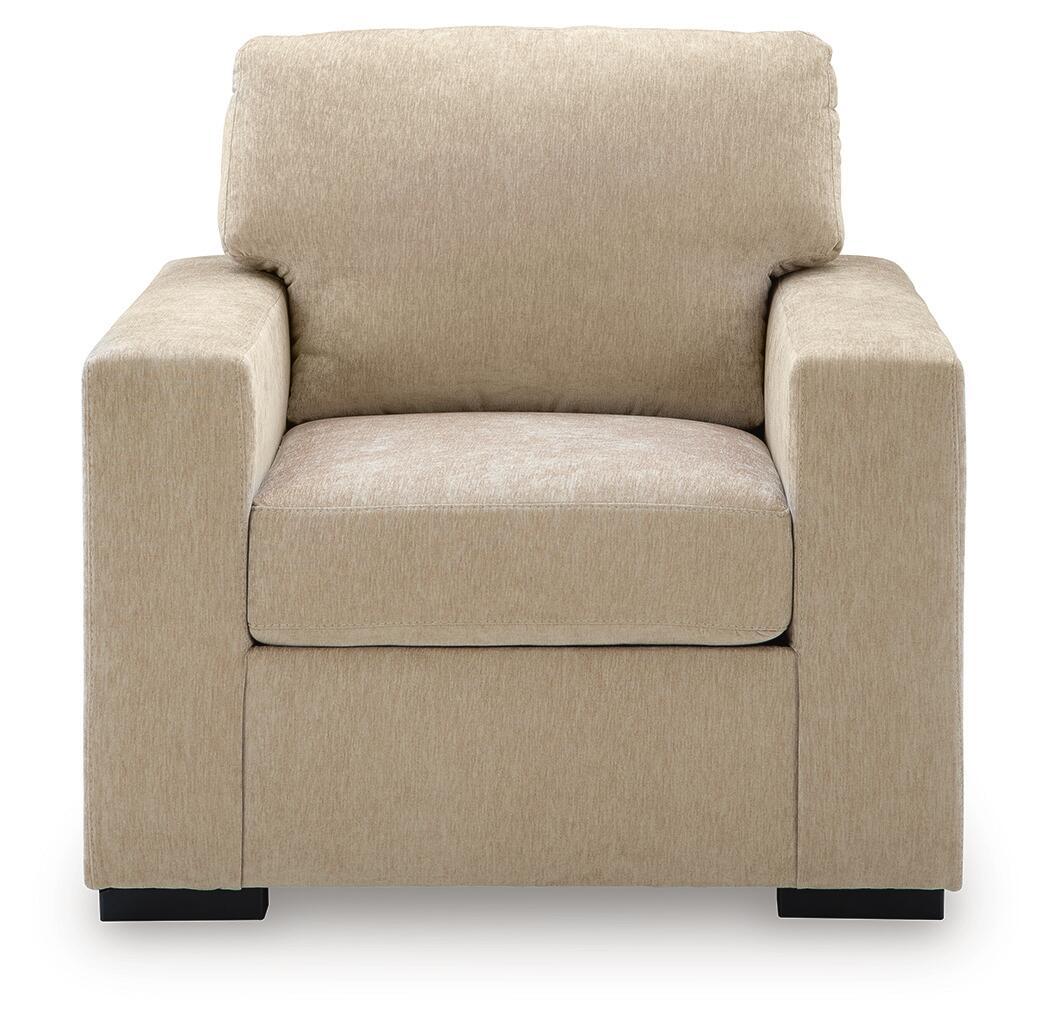 Light beige fabric accent chair viewed from front, padded arms and cushioned backrest.