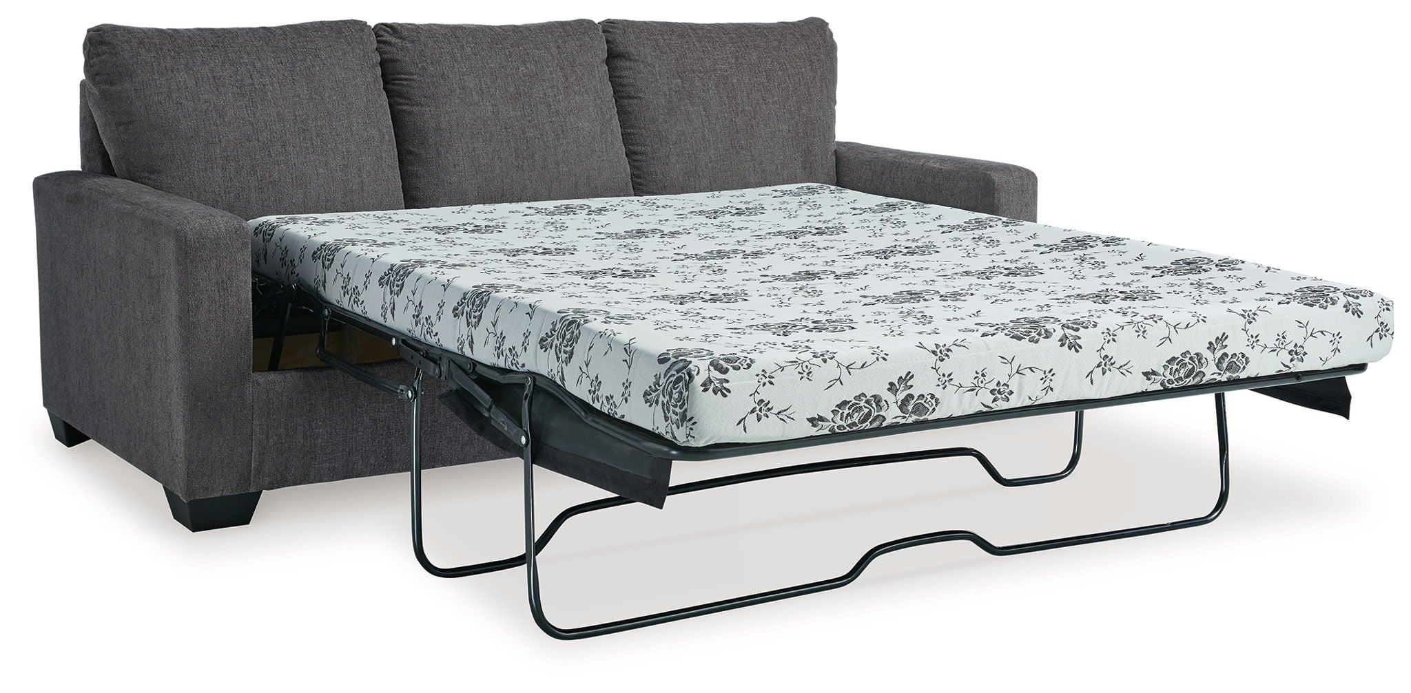 Dark gray sofa bed with pulled-out mattress and floral patterned cover